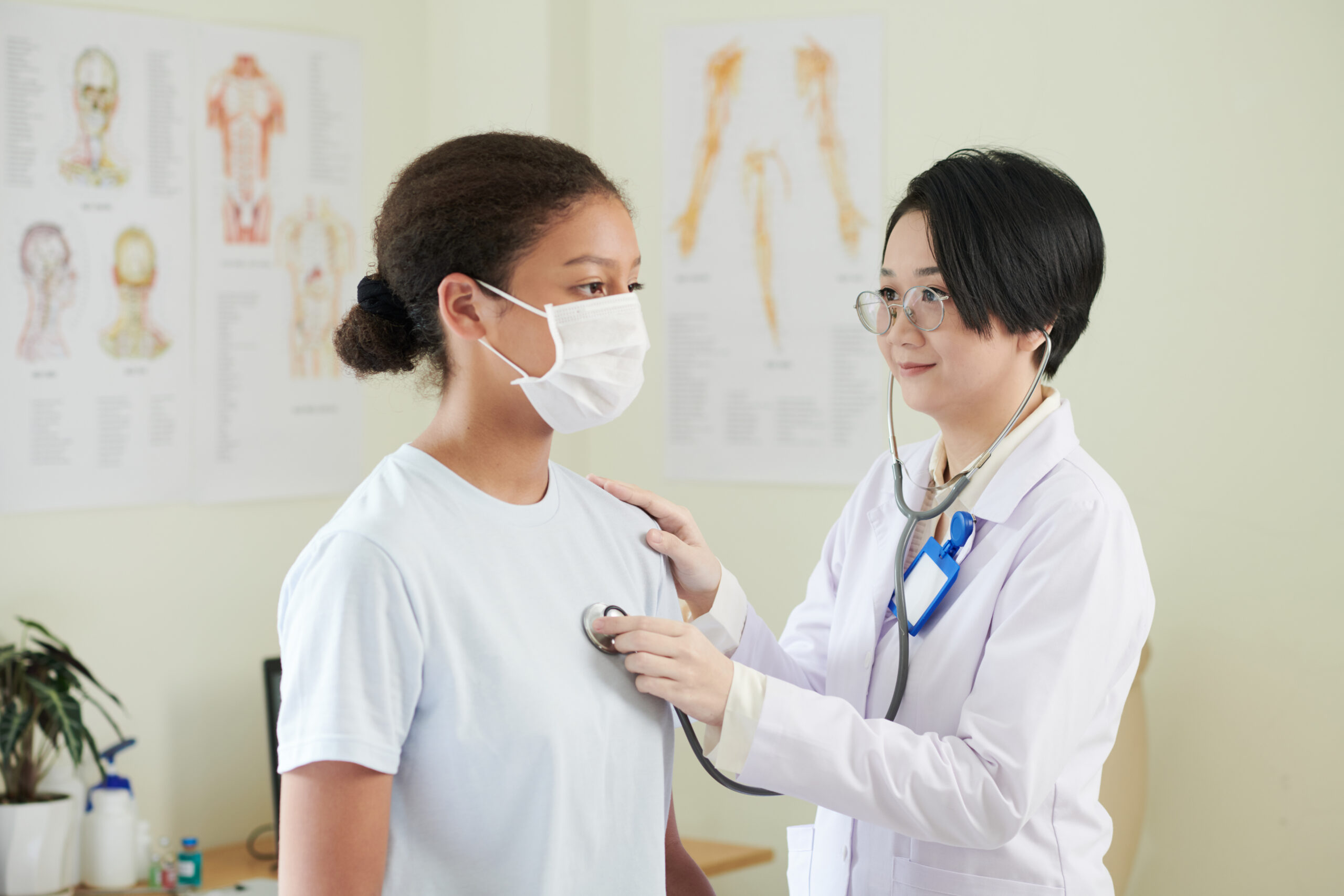 Doctor Examining Teenage Girl